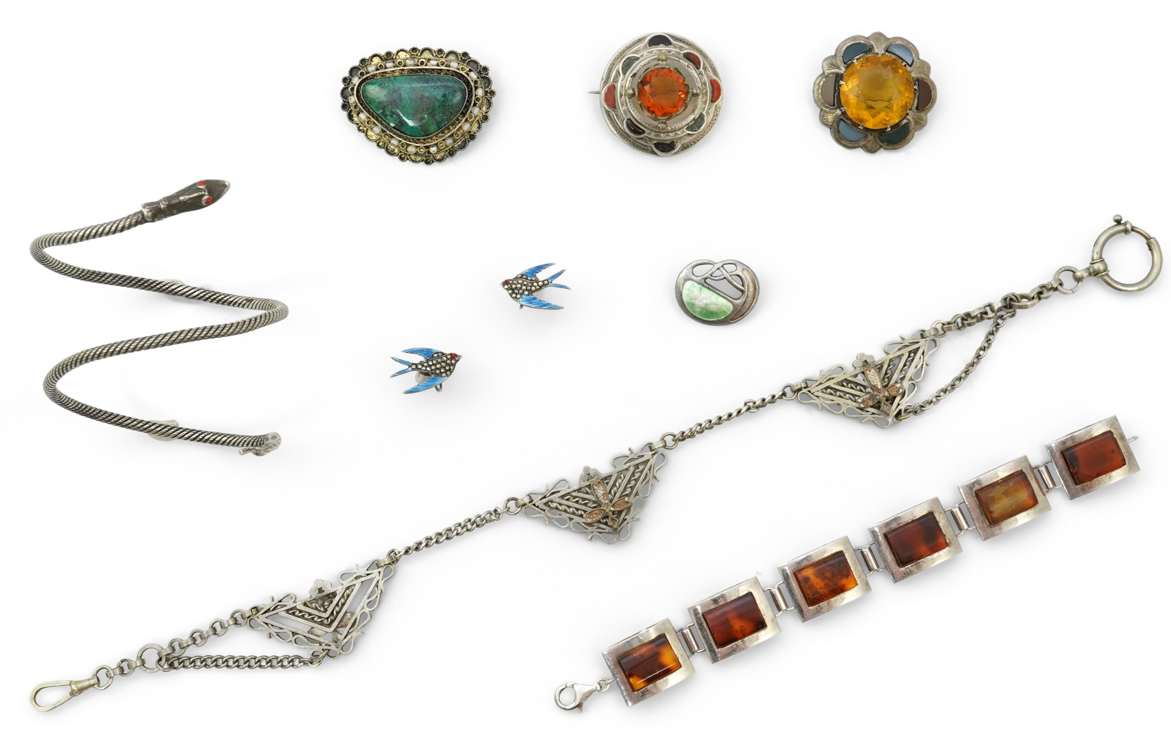 A collection of jewels including a Belgian silver and amber bracelet, and an Arts & Crafts brooch by Charles Horner